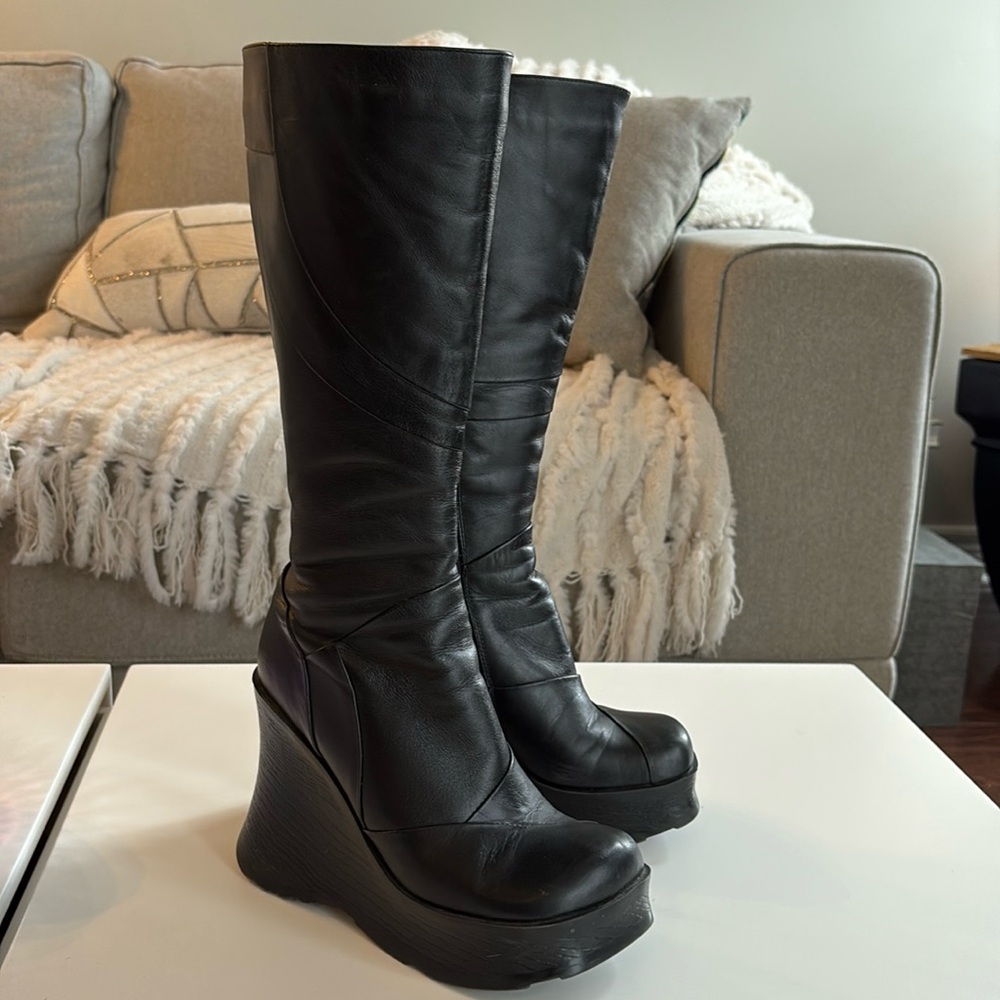 Wedge leather boots.